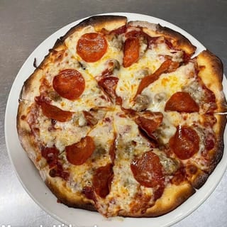 Personal Pizza two toppings with a side salad